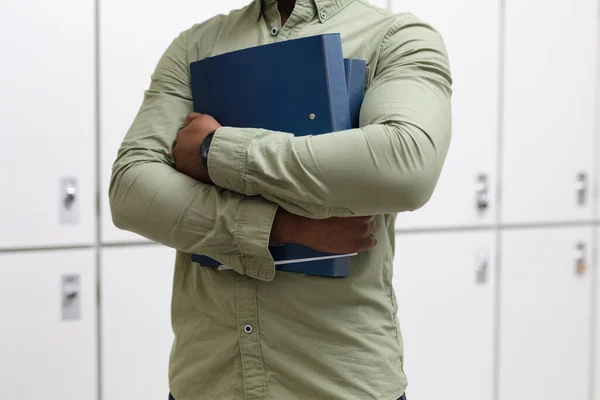 Midsection African American Young Male Teacher Files Standing Lockers Corridor — Stock Photo, Image