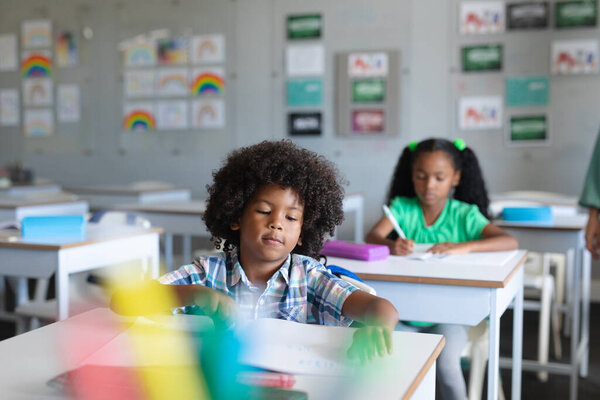 African American Elementary School Students Studying Desk Classroom Unaltered Education Royalty Free Stock Photos