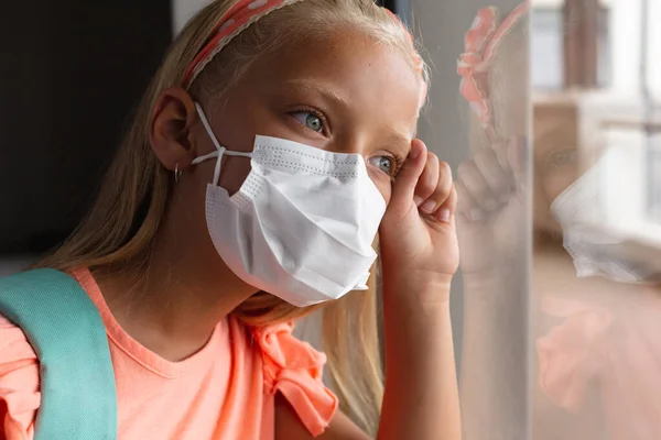 Close Caucasian Elementary Schoolgirl Wearing Mask While Leaning Glass Window — Stock Photo, Image