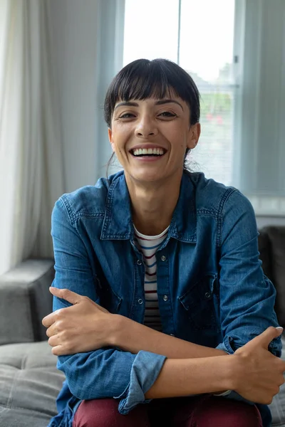 Portrait Cheerful Caucasian Young Woman Sitting Arms Crossed Home Unaltered — Stock Photo, Image