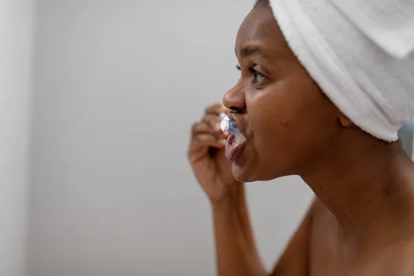 African American Mid Adult Woman Brushing Teeth Bathroom Unaltered Dental — Stock fotografie