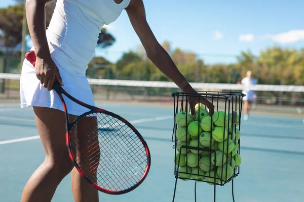 Midsection Female African American Player Practicing Tennis Court Sunny Day — Stok fotoğraf