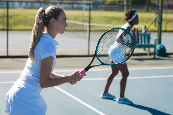 Caucasian Female Player Playing Game African American Doubles Partner Tennis — Fotografia de Stock
