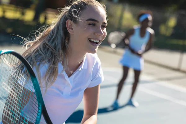 Cheerful Young Female Caucasian Tennis Player African American Partner Court — Zdjęcie stockowe