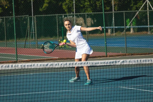 Full Length Young Female Caucasian Player Hitting Ball Racket Tennis — Stock Photo, Image