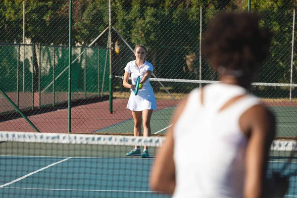 Caucasian Female Player Serving Tennis Ball Competitor Court Sunny Day — Stock Photo, Image