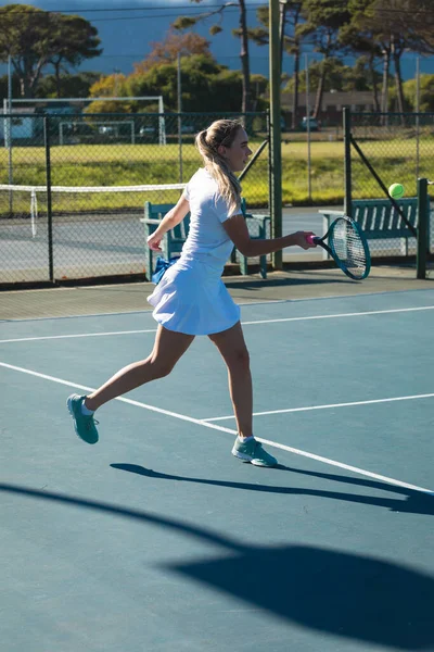 Full Length Young Female Caucasian Player Hitting Ball Racket Tennis — Stock Photo, Image
