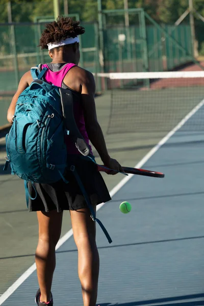 Rear View African American Young Female Tennis Player Backpack Walking — Zdjęcie stockowe