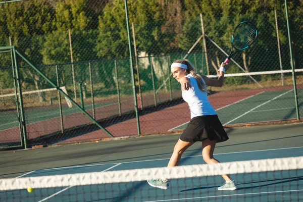 Full Length Young Female Caucasian Tennis Player Hitting Ball Court — Stock Photo, Image