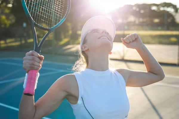 Excited Young Caucasian Female Tennis Player Celebrating Game Win Court — Zdjęcie stockowe