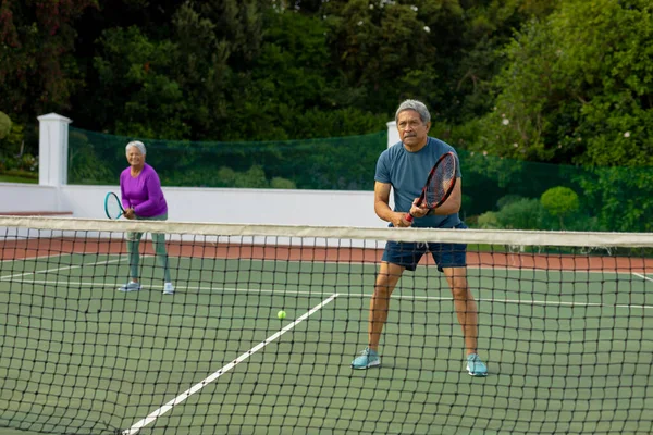 Full Length Biracial Senior Man Playing Tennis Senior Woman Tennis — Foto de Stock