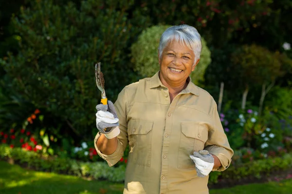 Portrait Smiling Biracial Senior Woman Short Hair Wearing Gloves Holding — Photo