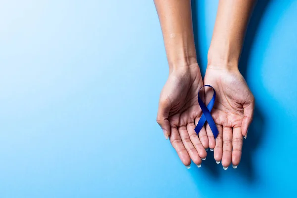 Cropped Hands Woman Holding Blue Awareness Ribbon Blue Background Copy — Foto Stock