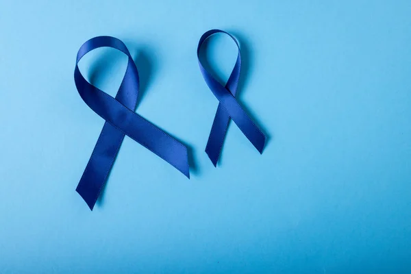 Blue Stomach Cancer Awareness Ribbons Isolated Blue Background Copy Space — Stock Photo, Image