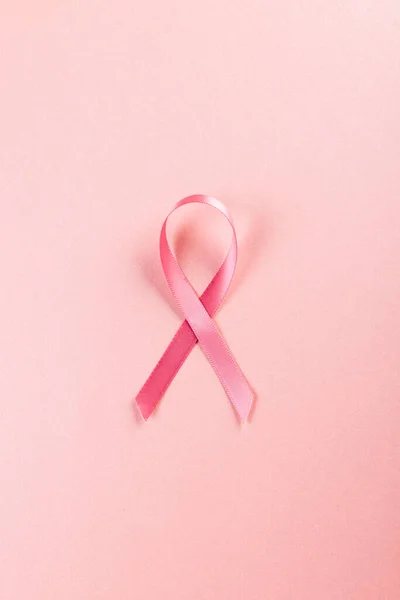 Directly Shot Pink Breast Cancer Awareness Ribbon Isolated Pink Background — Stockfoto