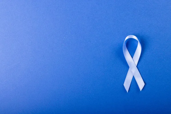 Directly Shot Stomach Cancer Awareness Blue Ribbon Isolated Blue Background — Foto Stock