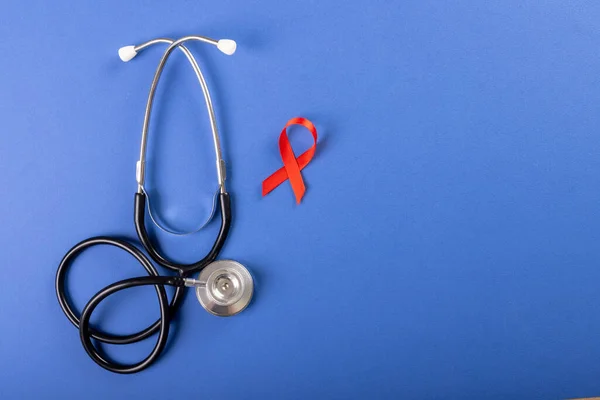 Directly Shot Stethoscope Red Aids Awareness Ribbon Blue Background Copy — Stock Photo, Image