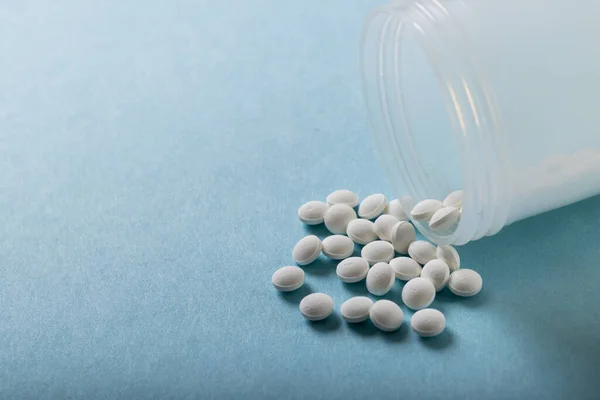 High Angle Close White Medicines Spilled Bottle Blue Background Copy — Stok fotoğraf