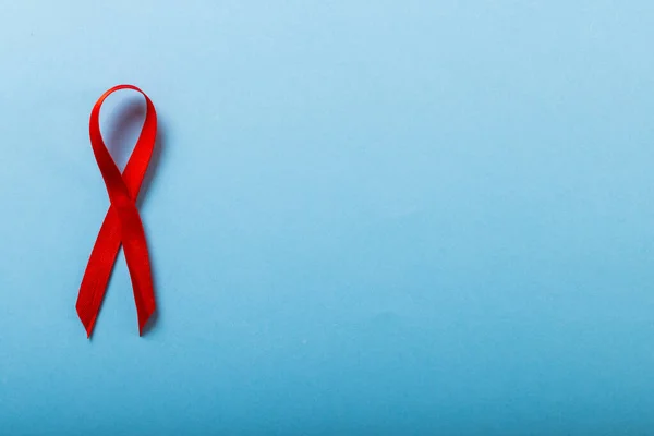 Directly Shot Aids Awareness Ribbon Red Isolated Blue Background Copy — Stock Photo, Image