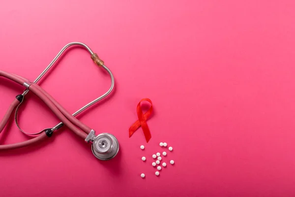 Directly Shot Red Aids Awareness Ribbon Stethoscope Medicines Pink Background — Stock Photo, Image