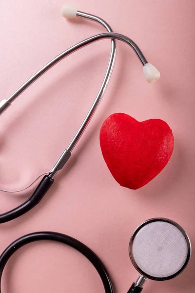 Overhead Close Stethoscope Red Heart Shape Pink Background Copy Space — Stock Photo, Image