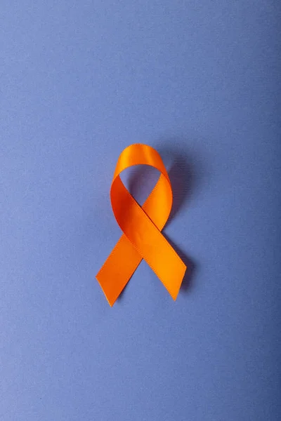 Directly Shot Orange Leukemia Awareness Ribbon Isolated Blue Background Copy — Stock Photo, Image