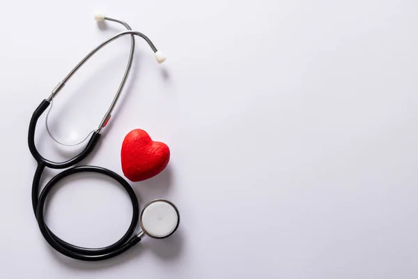 Overhead View Red Heart Shape Stethoscope White Background Copy Space — Stock Fotó