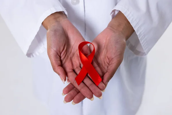 Midsection Female Doctor Hands Red Aids Awareness Ribbon Doctor Hiv — Stok fotoğraf