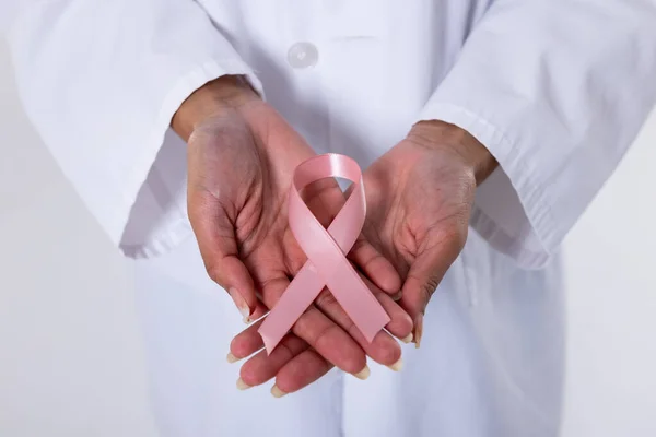 Midsection Female Doctor Pink Breast Cancer Awareness Ribbon Hand Breast — Stockfoto