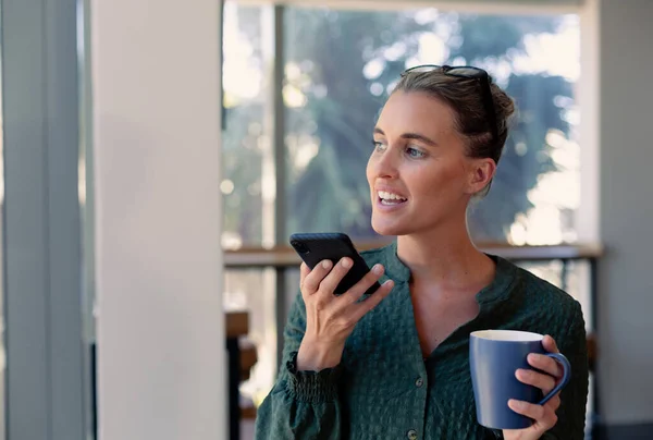 Caucasian Young Female Advisor Holding Coffee Mug Talking Smartphone Speaker — Foto de Stock