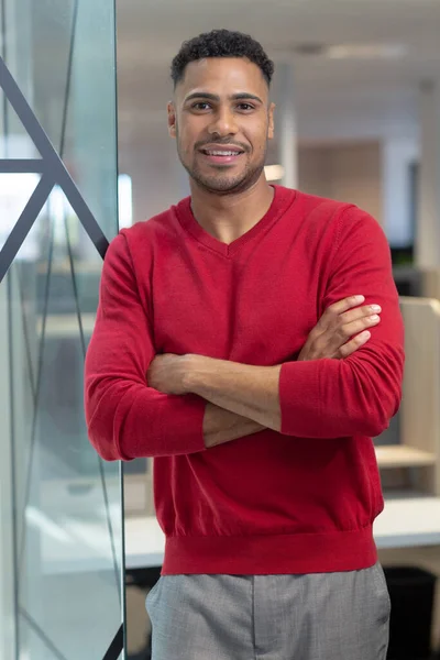 Portrait Smiling Male Hispanic Professional Arms Crossed Standing Modern Workplace — Stock fotografie