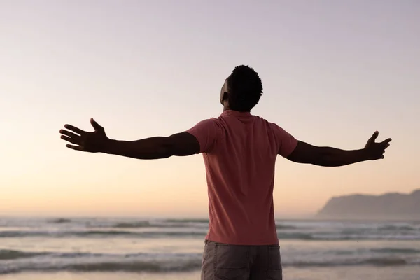 Rear View Carefree African American Young Man Arms Outstretched Standing — Foto Stock