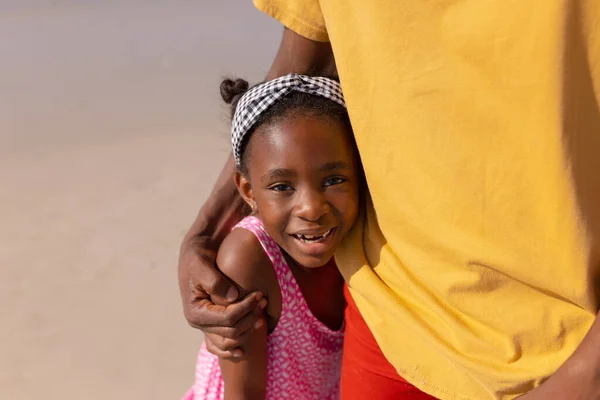 Portrait Happy African American Girl Embracing Young Father While Standing —  Fotos de Stock