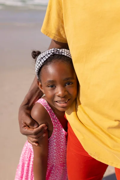 Midsection African American Young Man Embracing Smiling Daughter While Standing —  Fotos de Stock