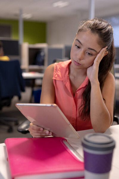 Tired Caucasian Female Advisor Looking Digital Tablet While Working Modern Stock Picture