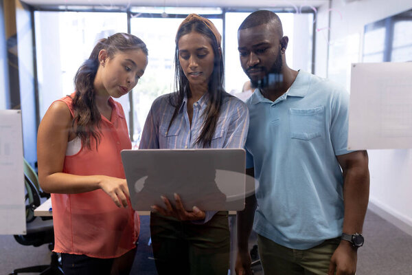 Young Multiracial Male Female Advisors Discussing Laptop Board Room Workplace Stock Image