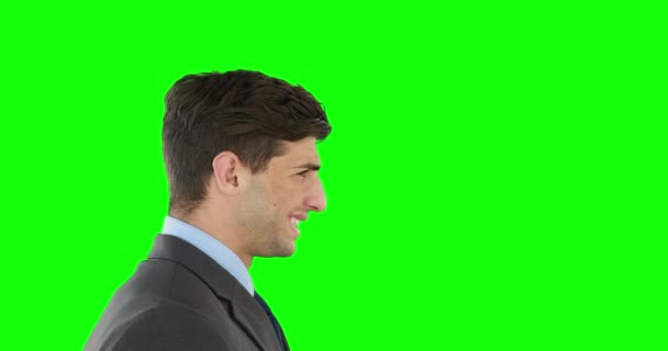 Young Businessman Getting Headache Green Background — Stock Video