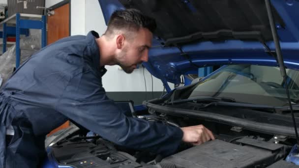 Mechanic Overhauling Engine Garage — Stock Video