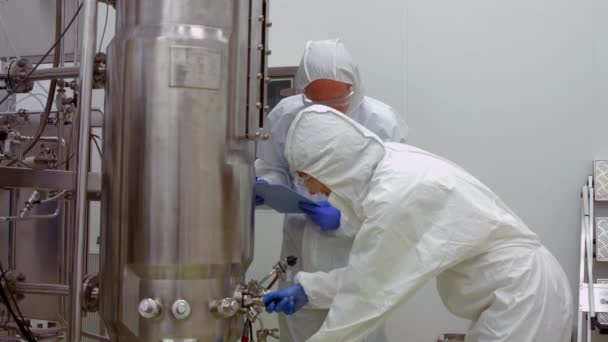 Scientists Protective Suits Working Together High Quality Format — Stock Video