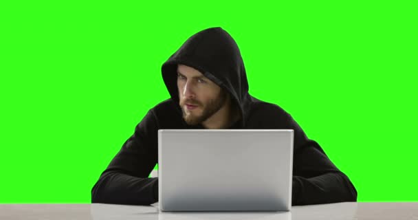 Computer Hacker Using Laptop Green Screen — Stock Video
