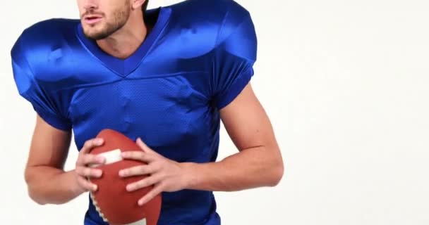 American Football Player Holding Ball High Quality Format — Stock Video