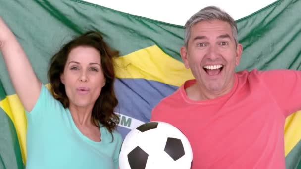 Excited Football Fan Couple Holding Brazil Flag White Background — Stock Video
