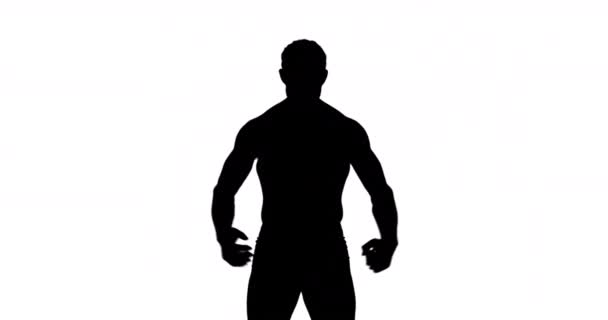 Silueta Musculară Omului Flexând Mușchii Fundal Alb — Videoclip de stoc
