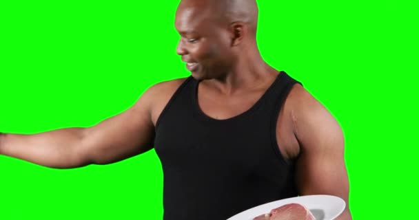 Hombre Musculoso Con Músculos Flexión Carne Sobre Fondo Verde — Vídeos de Stock