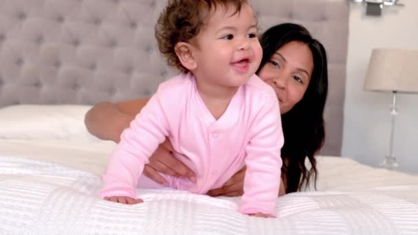 Mother Playing Baby Daughter Bed Home — Stock Video