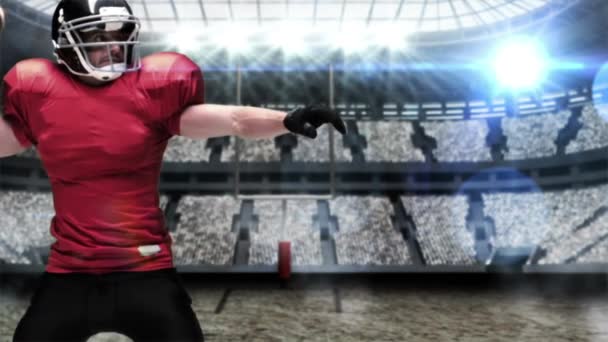 スローモーションでボールを起動するアメリカン フットボール選手をタックル — ストック動画