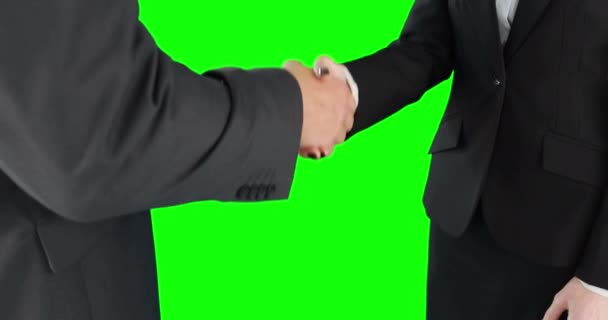在绿色屏幕上业务人握手 — 图库视频影像