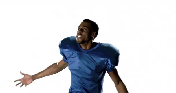 白い背景の上のアメリカン フットボール プレーヤー — ストック動画
