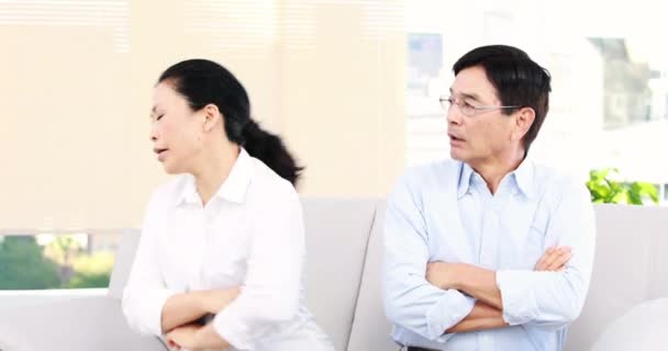 Mature Asian Couple Arguing Sofa — Stock Video