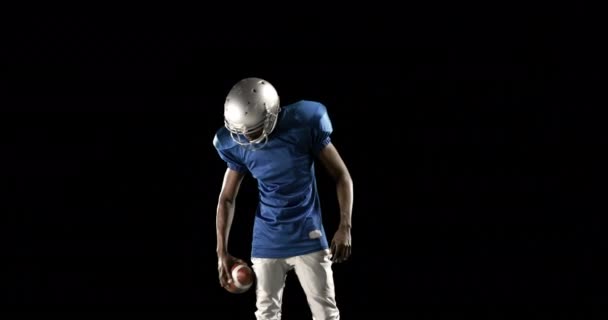 American Football Player Looking Camera Black Background — Stock Video